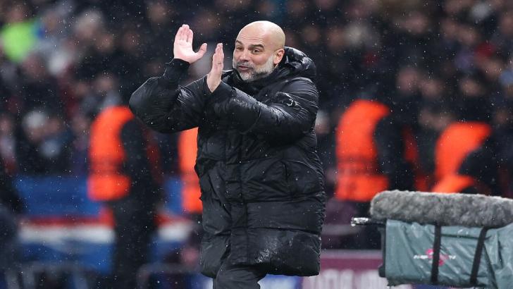 Pep Guardiola applauds the Man City fans